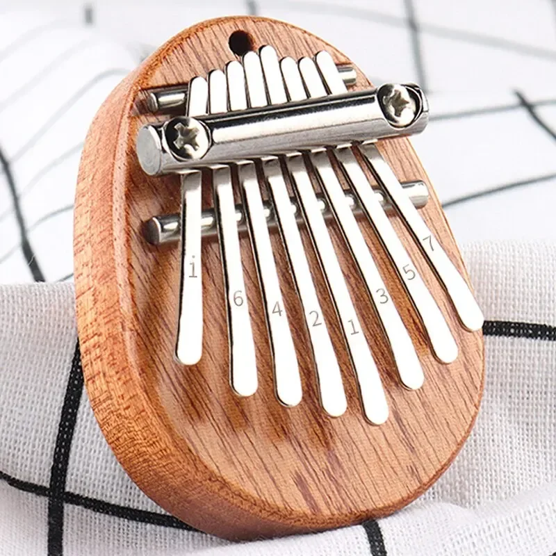 بيانو إصبع خشبي صغير بـ 8 نغما - مراجعة Musical Instrument Piano وسعره